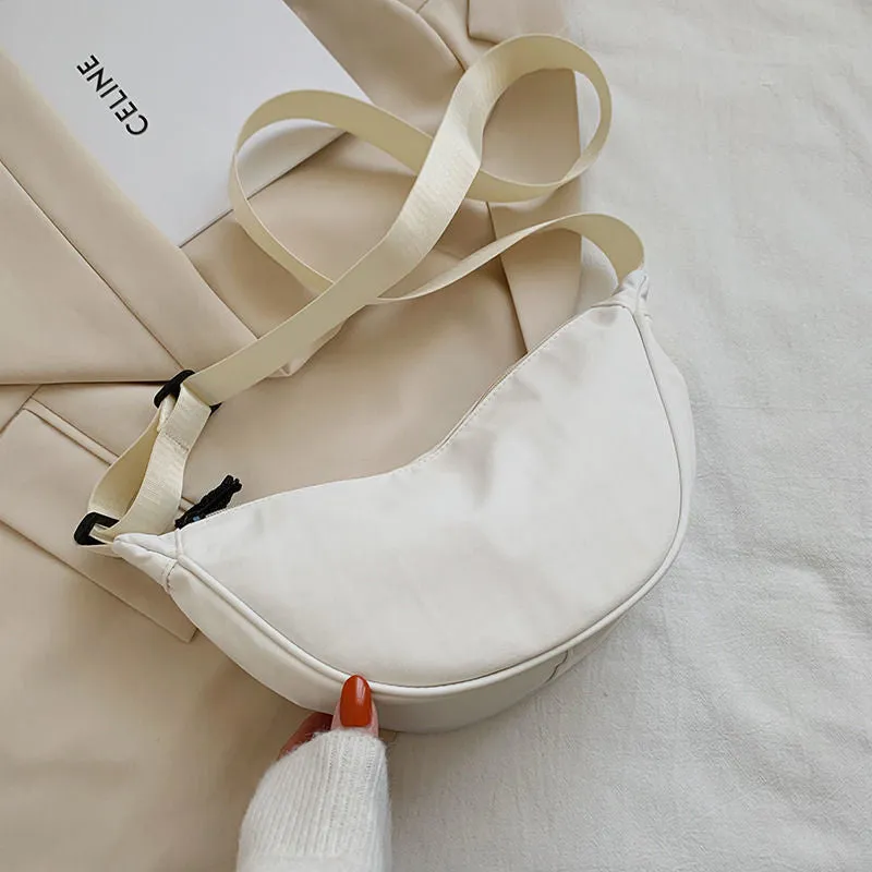 deanwangkt  nylon messenger bag women's new trendy dumpling bag lightweight small shoulder bag armpit bag simple shoulder canvas bag