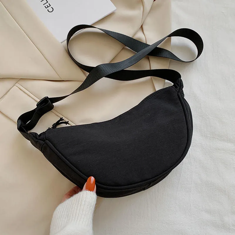 deanwangkt  nylon messenger bag women's new trendy dumpling bag lightweight small shoulder bag armpit bag simple shoulder canvas bag