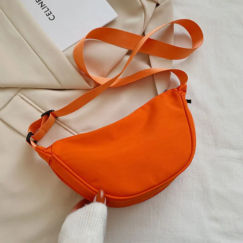 deanwangkt  nylon messenger bag women's new trendy dumpling bag lightweight small shoulder bag armpit bag simple shoulder canvas bag