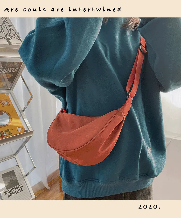 deanwangkt  nylon messenger bag women's new trendy dumpling bag lightweight small shoulder bag armpit bag simple shoulder canvas bag